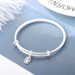 The traditional silver-plated bracelet with the word 